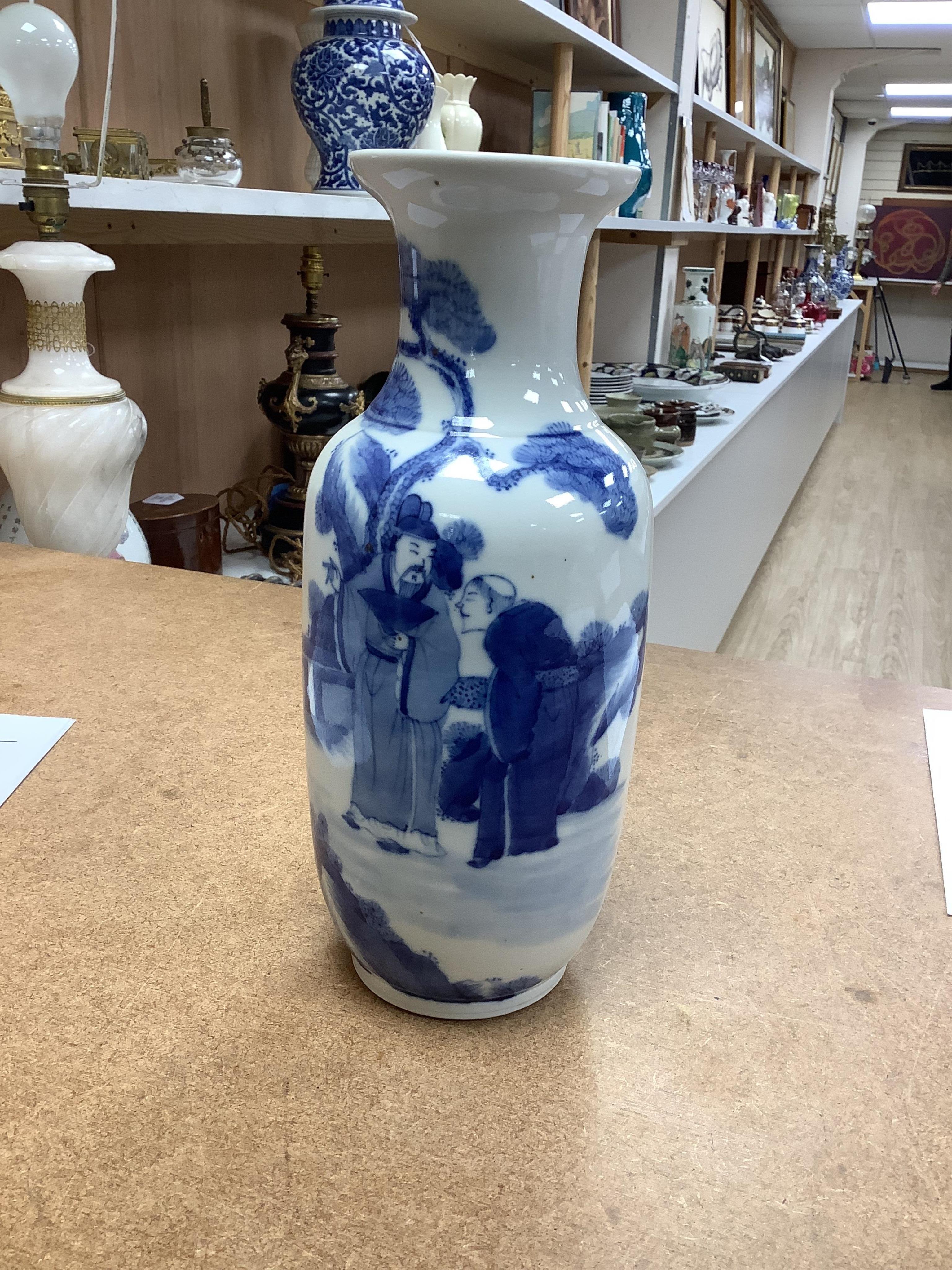 A Chinese blue and white rouleau vase, 25.5cm high. Condition - good